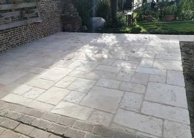 réalisation d'une terrasse en pierre reconstituée proche de Caudry